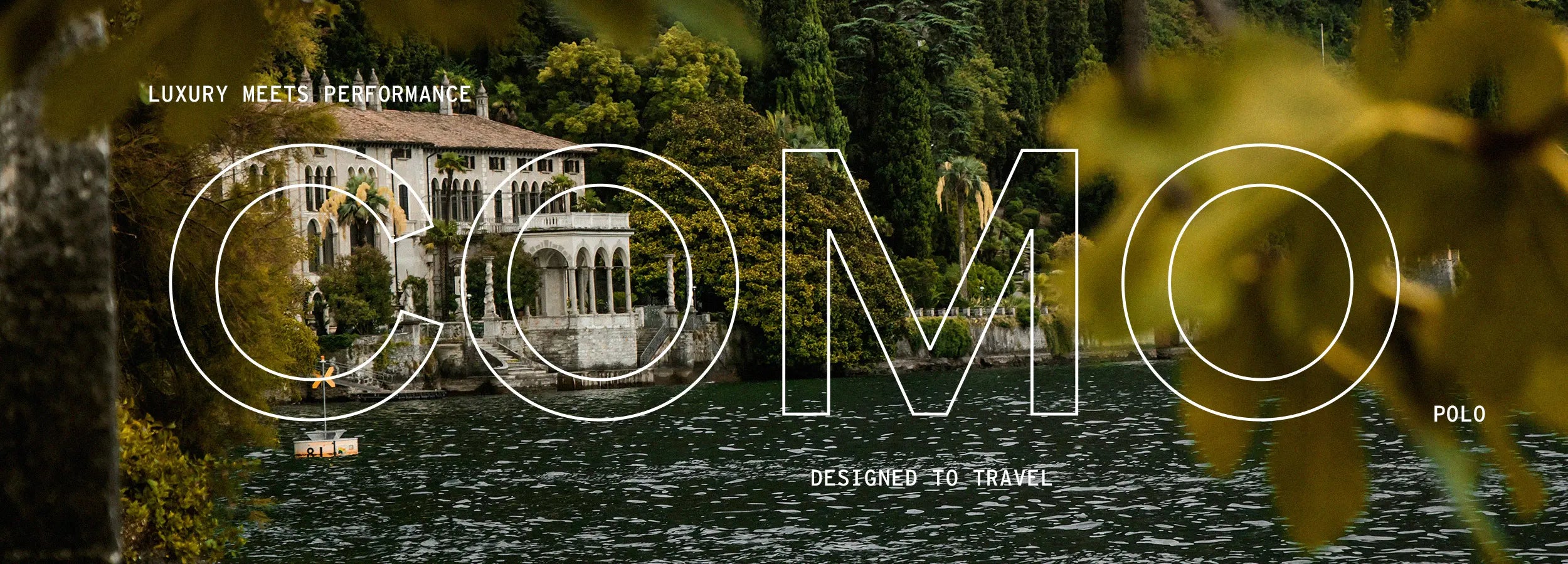 Lake Como scenic view with text 'Luxury meets performance. Como Polo. Designed to travel' highlighting elegance and functionality.