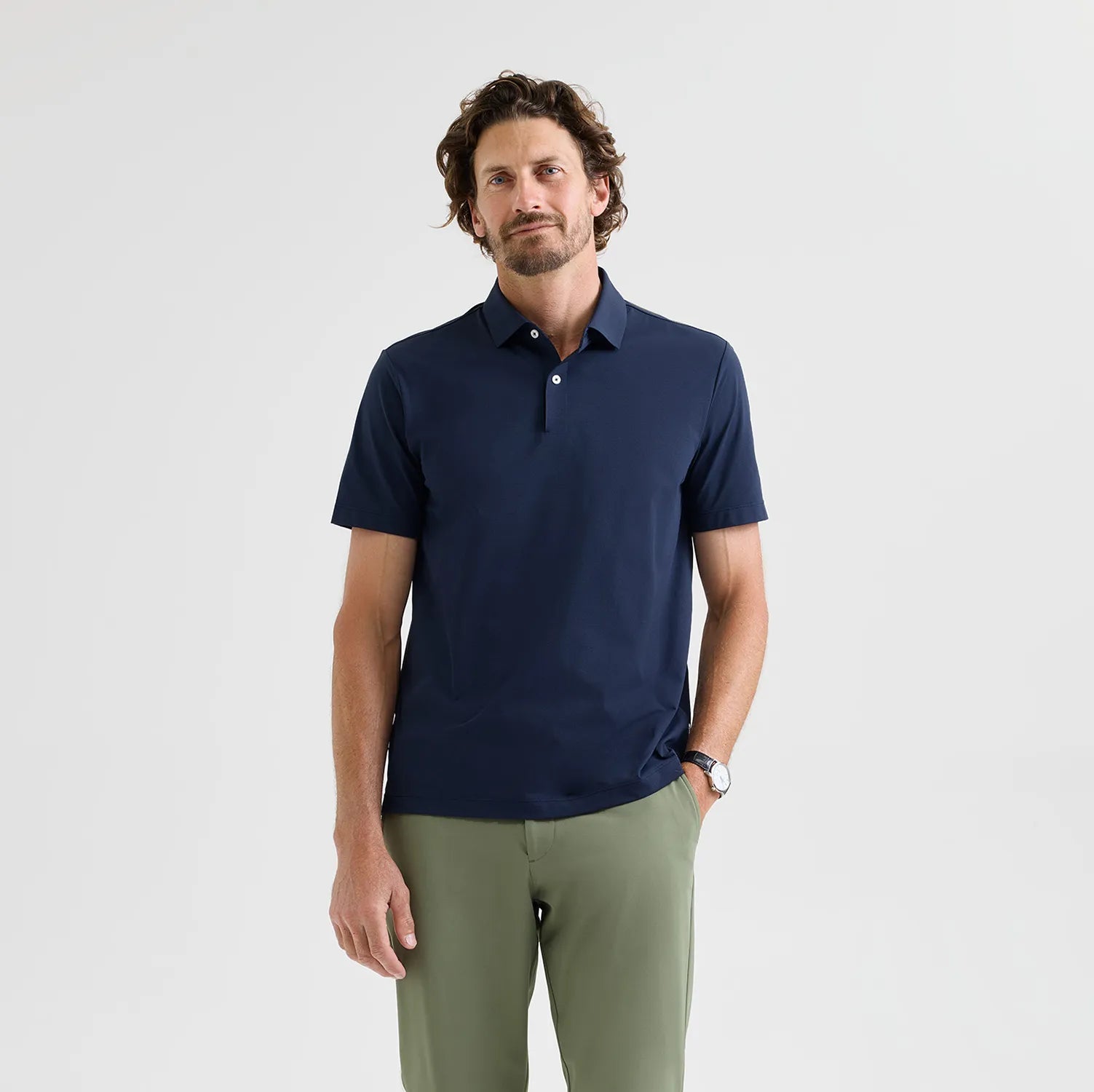 Navy Como Travel Polo – a refined travel essential with odour-resistant fabric, perfect for business trips or casual wear.