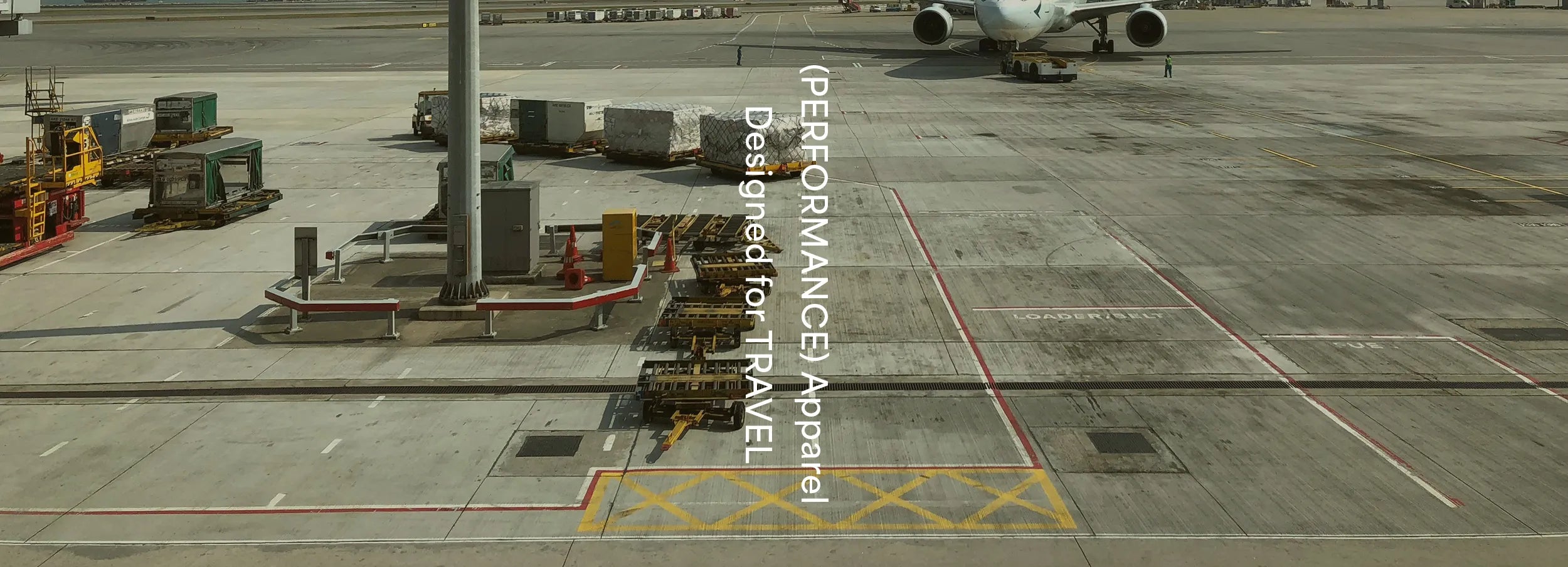 Airport exterior scene with focus on performance apparel – designed for seamless travel, offering style, comfort, and durability.