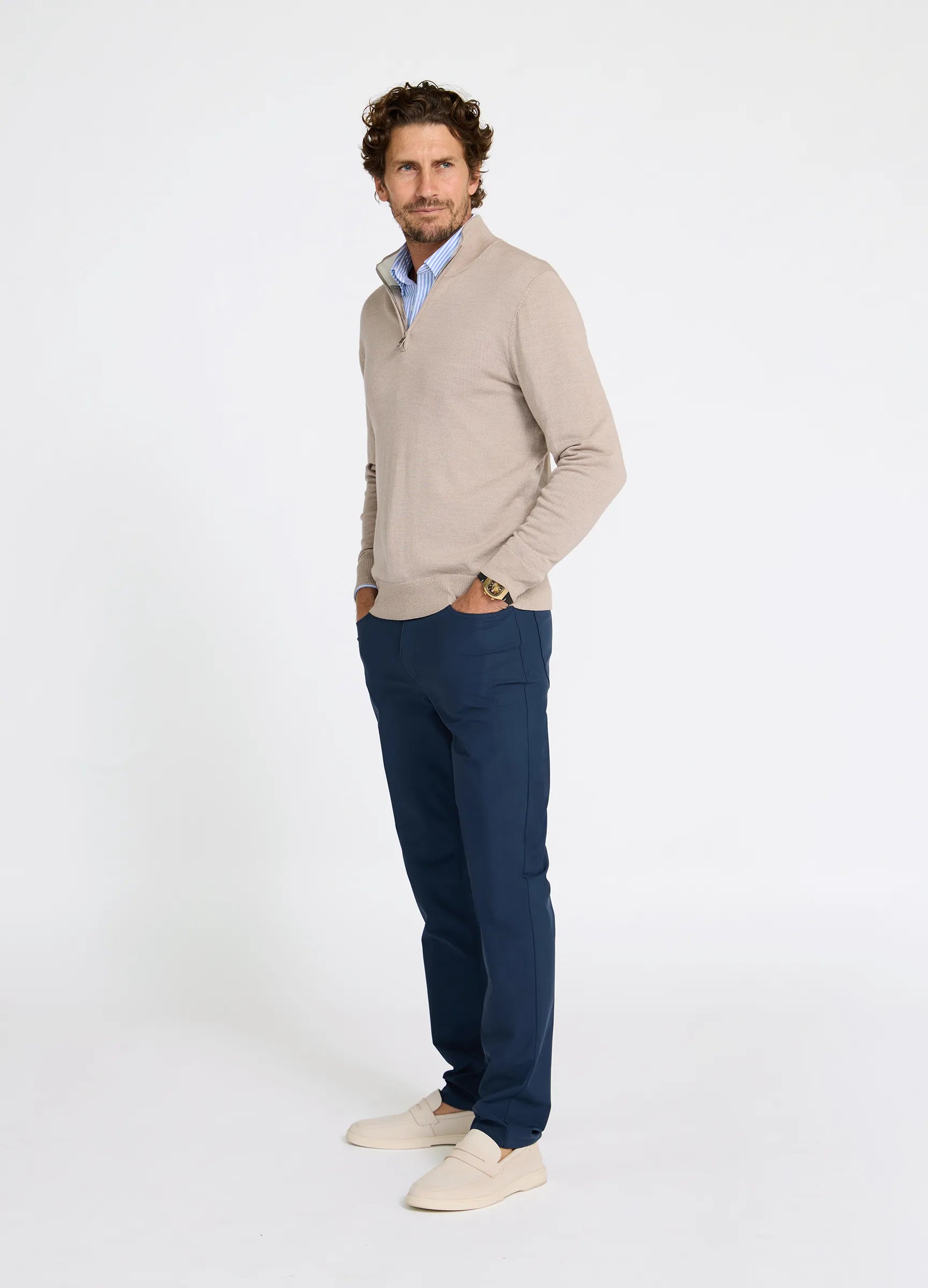 Mens outfit wearing Verbier Merino Travel Quarter Zip in Fawn styled with Four Seasons Pant for travel #color_fawn