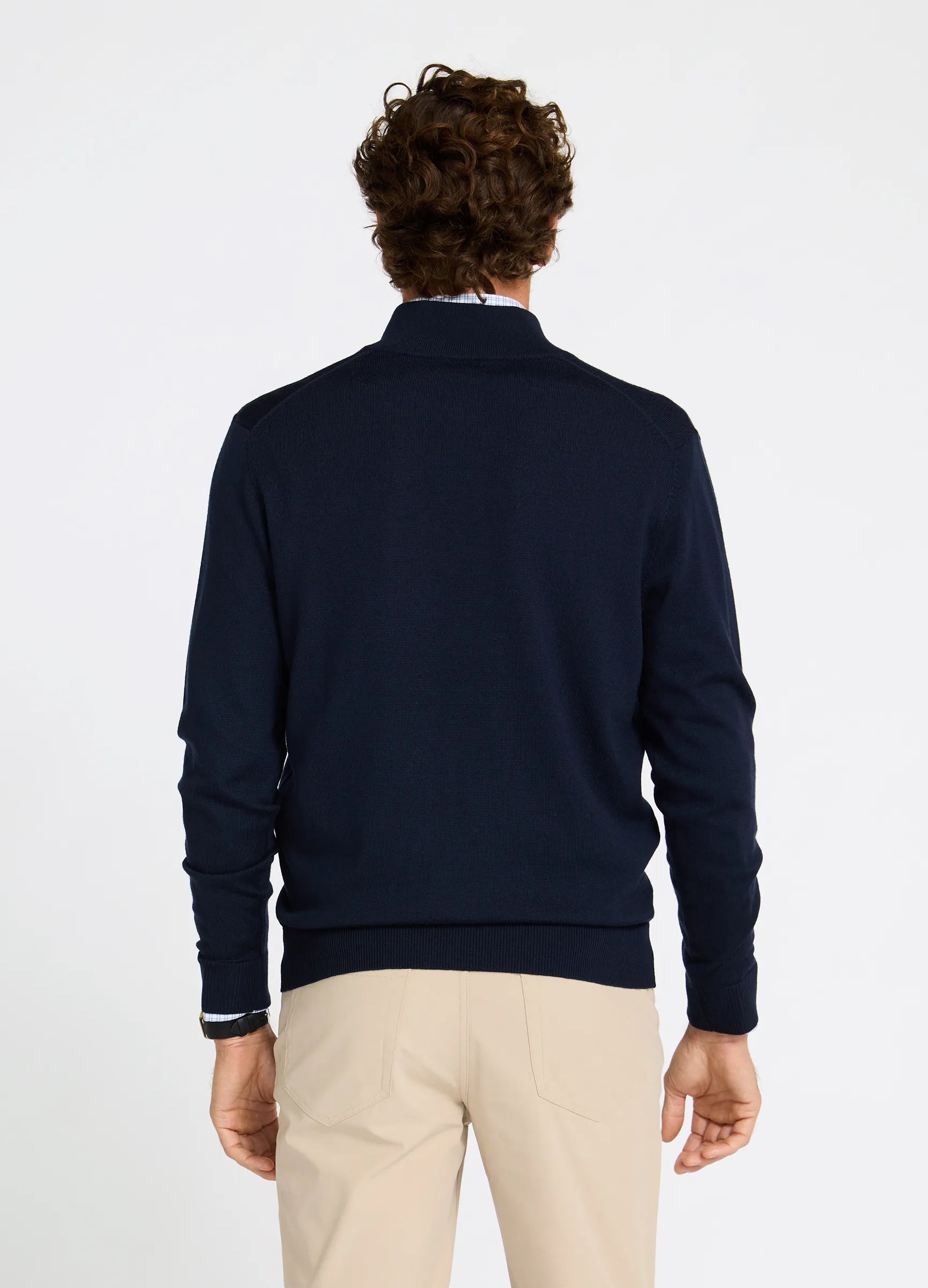 Verbier Merino Travel Quarter Zip back view in Navy showing clean tailored fit #color_navy