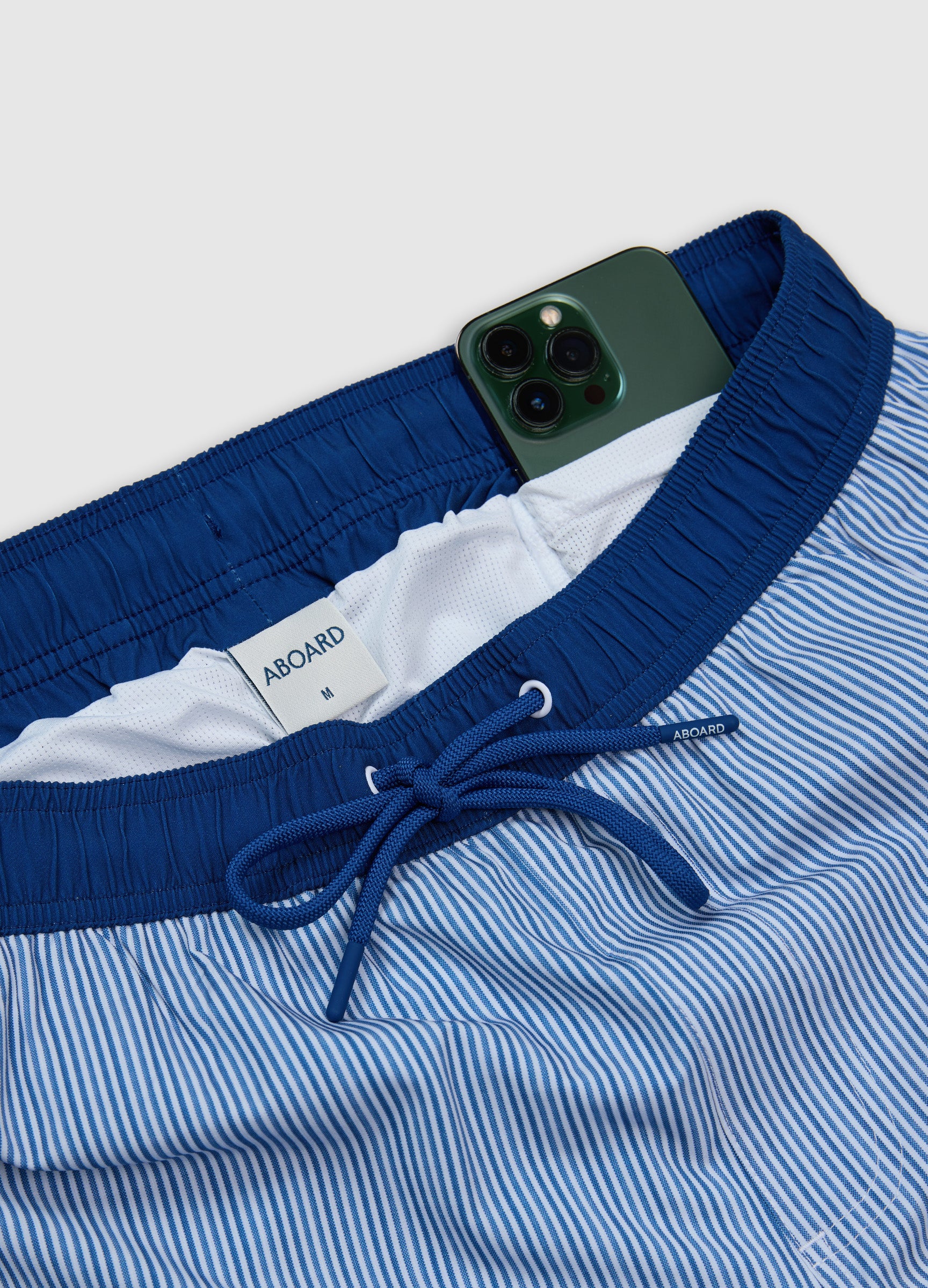 Close-up of Noosa Swim Short phone pocket detail for secure storage