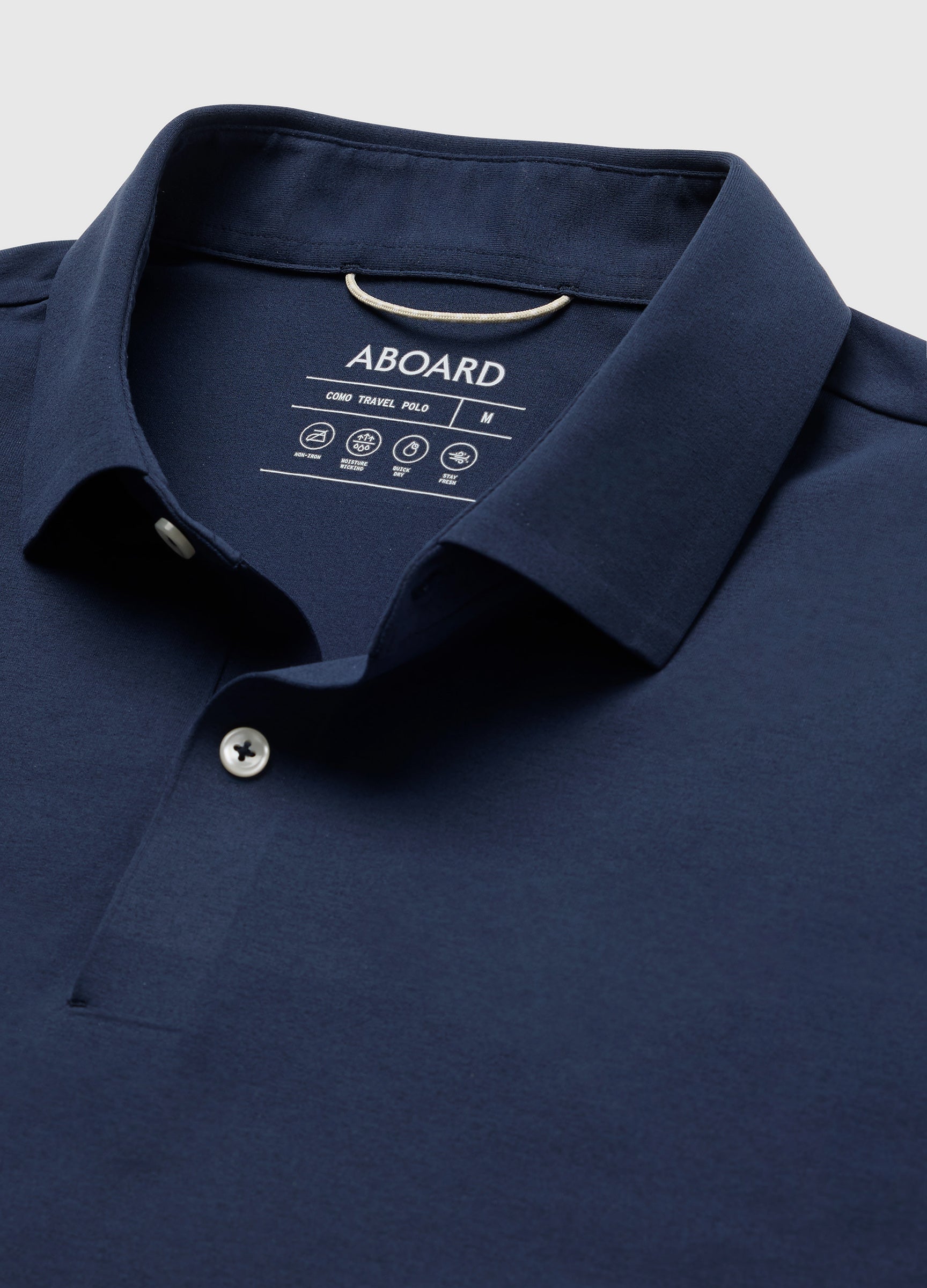 Como Long Sleeve Travel Polo in Navy – Collar Detail Flat Lay, Performance Polo with Breathable, Crease-Resistant Fabric #color_navy