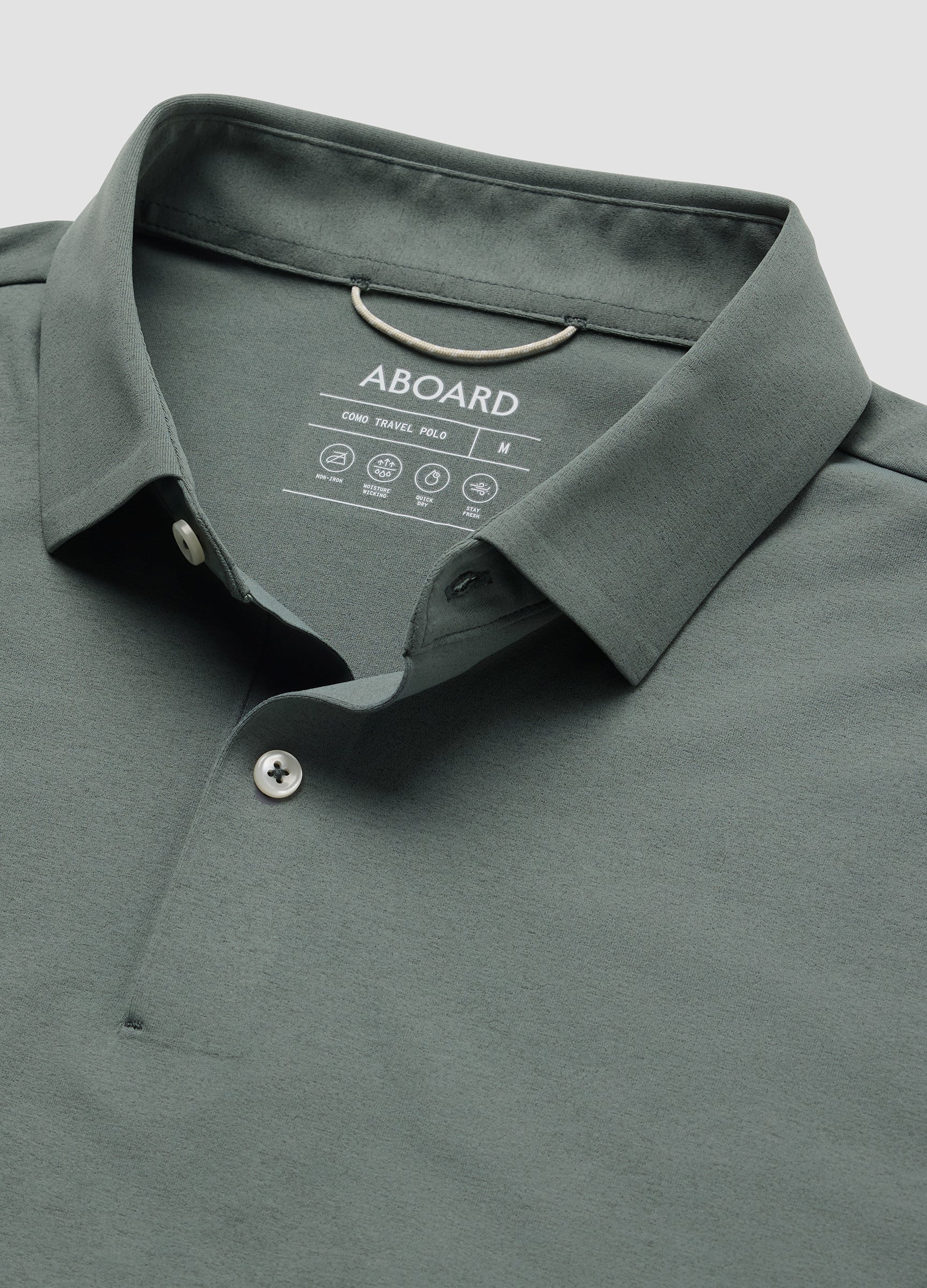 Como Long Sleeve Travel Polo in Sea Green – Collar Detail Flat Lay, Performance Polo with Breathable, Crease-Resistant Fabric #color_sea green