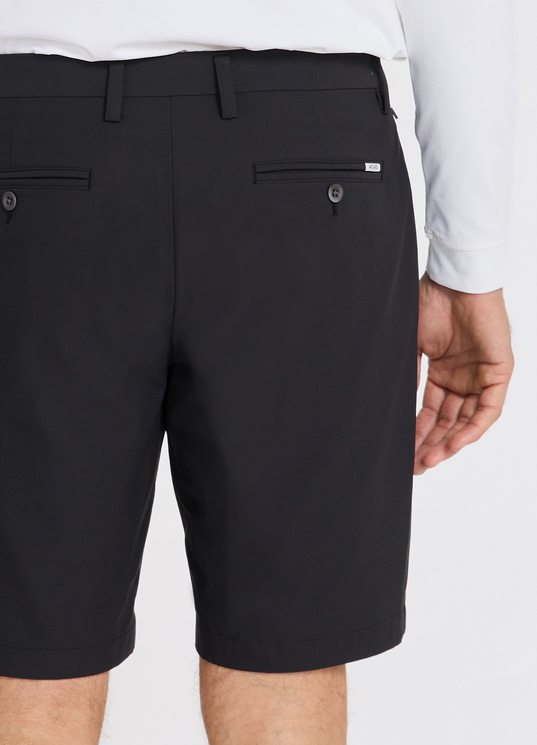 Positano Travel Chino Short in Black – Close-Up of Fabric & Luxury Corozo Nut Buttons #color_black