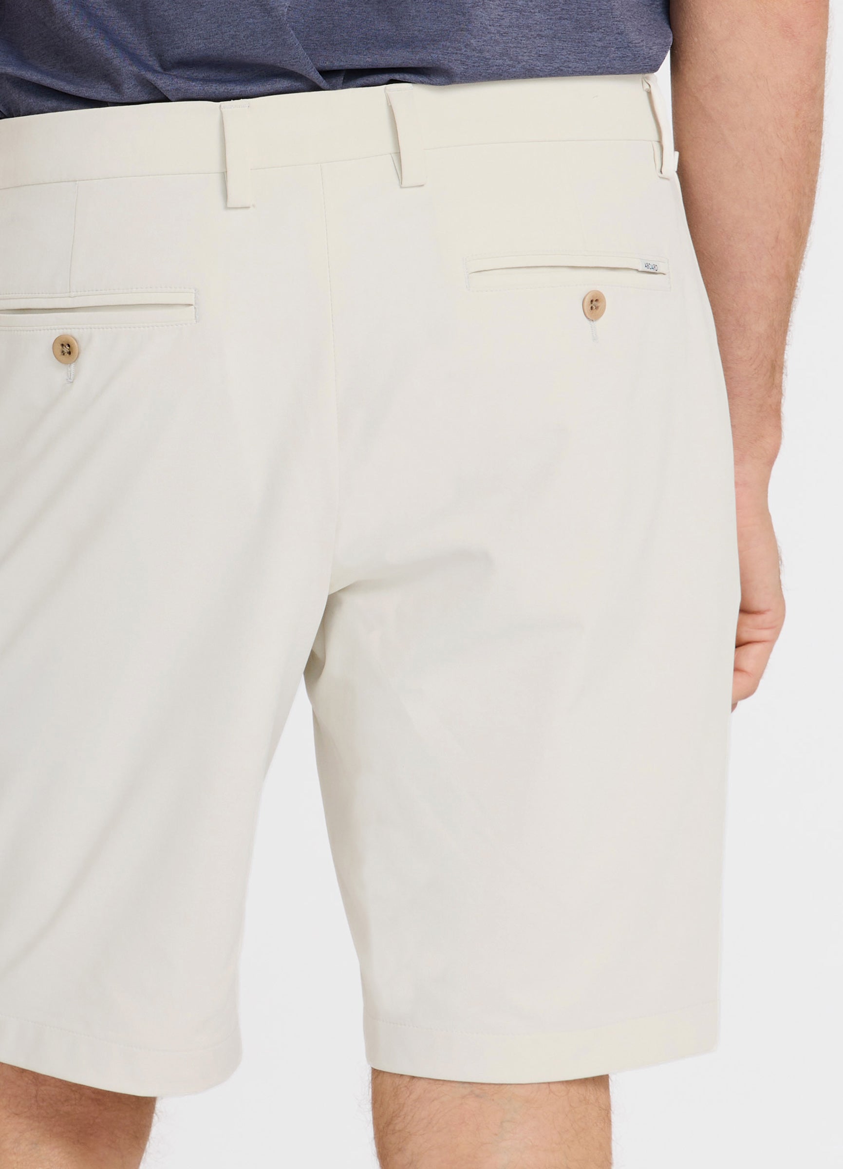 Positano Travel Chino Short in Bone – Close-Up of Premium Fabric & Luxury Corozo Nut Buttons #color_bone