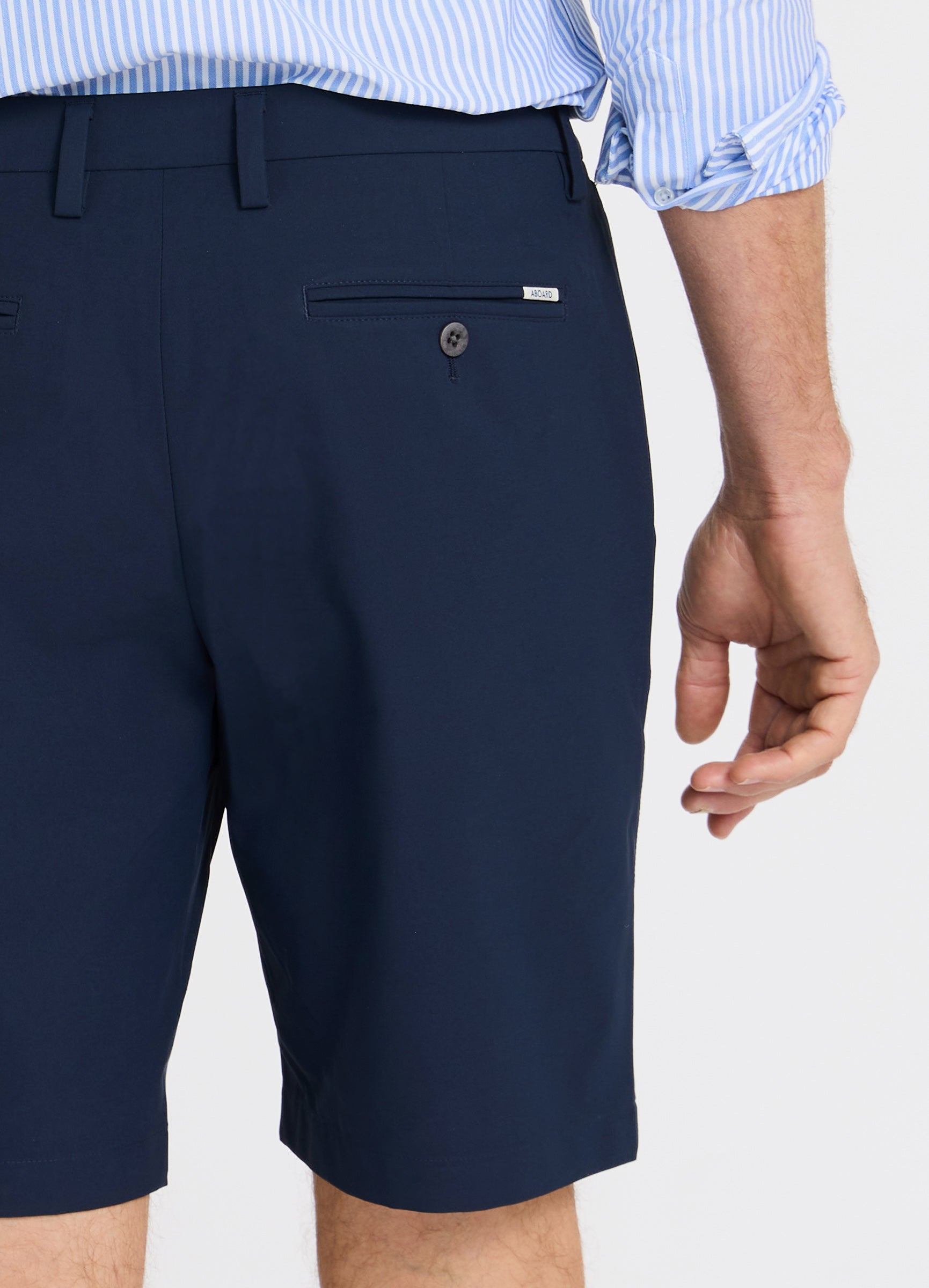Positano Travel Chino Short in Navy – Close-Up of Tailored Back Fit & Luxury Corozo Nut Buttons #color_navy