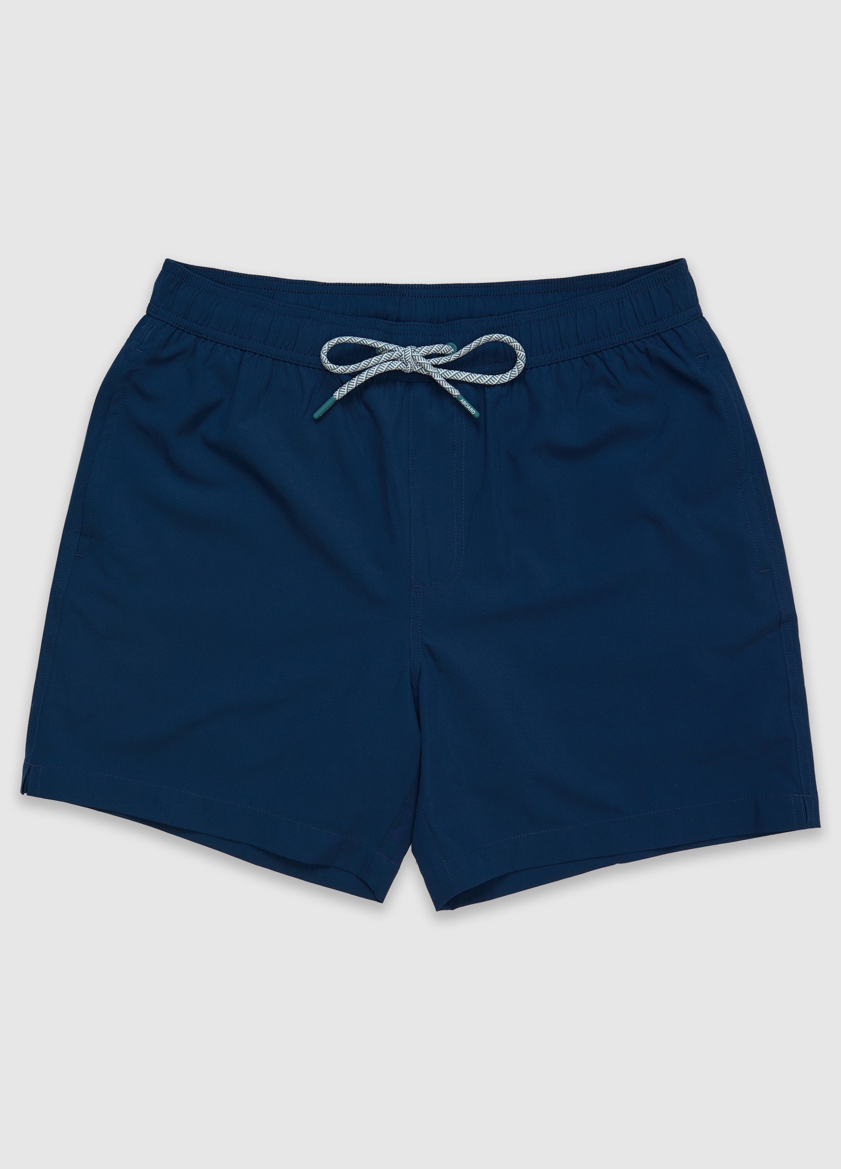 ABOARD Travel Flex Swim Short in navy – men’s quick-dry swim short, flat lay front view