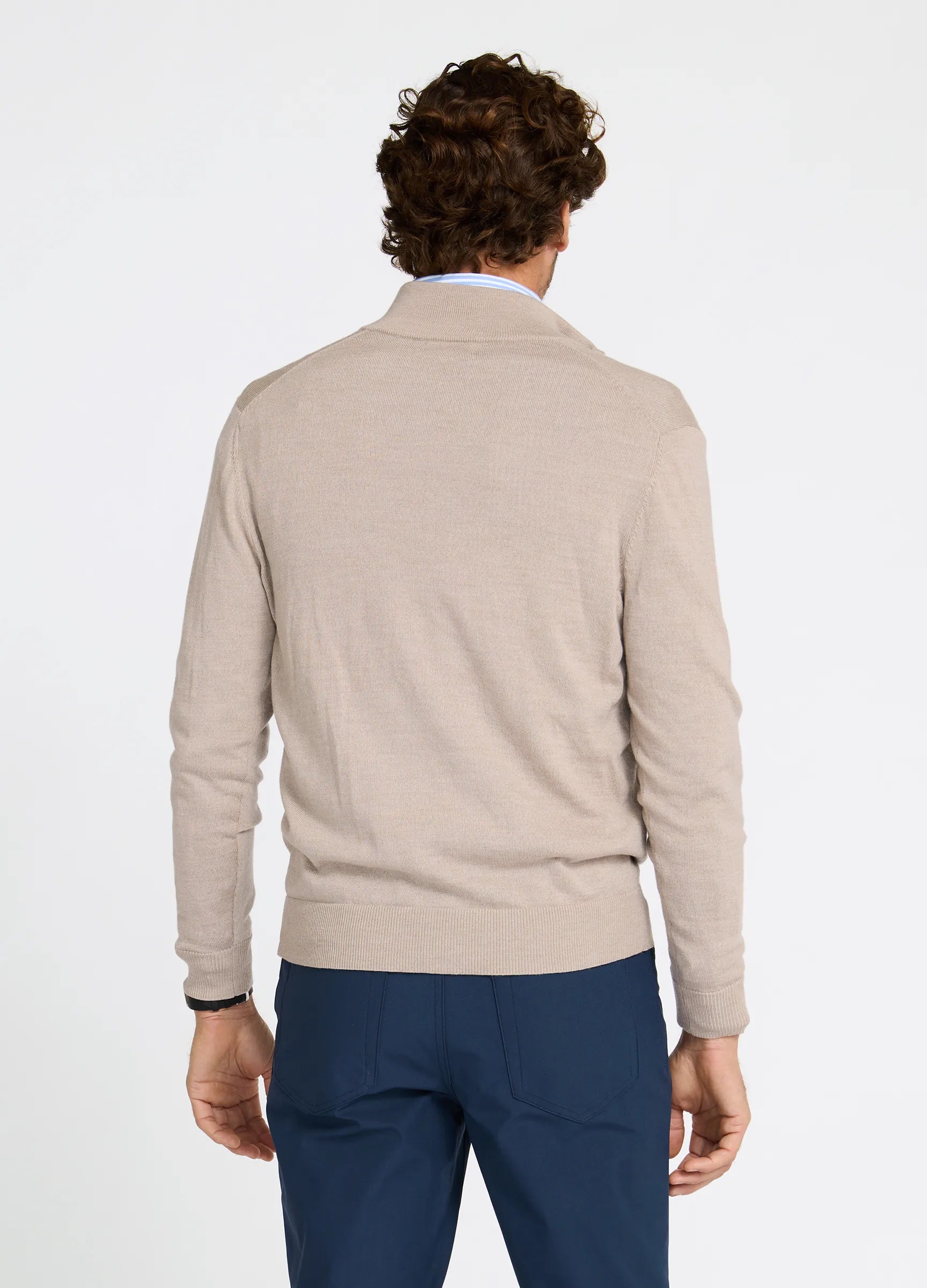 Verbier Merino Travel Quarter Zip back view in Fawn showing clean tailored fit #color_fawn