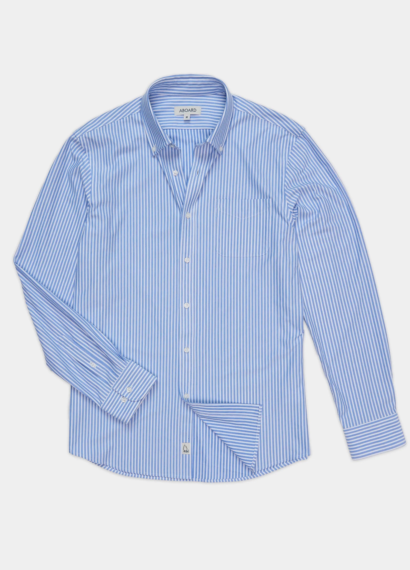Riviera Stripe Knit Oxford Travel Shirt flat lay — blue and white stripe men's travel shirt