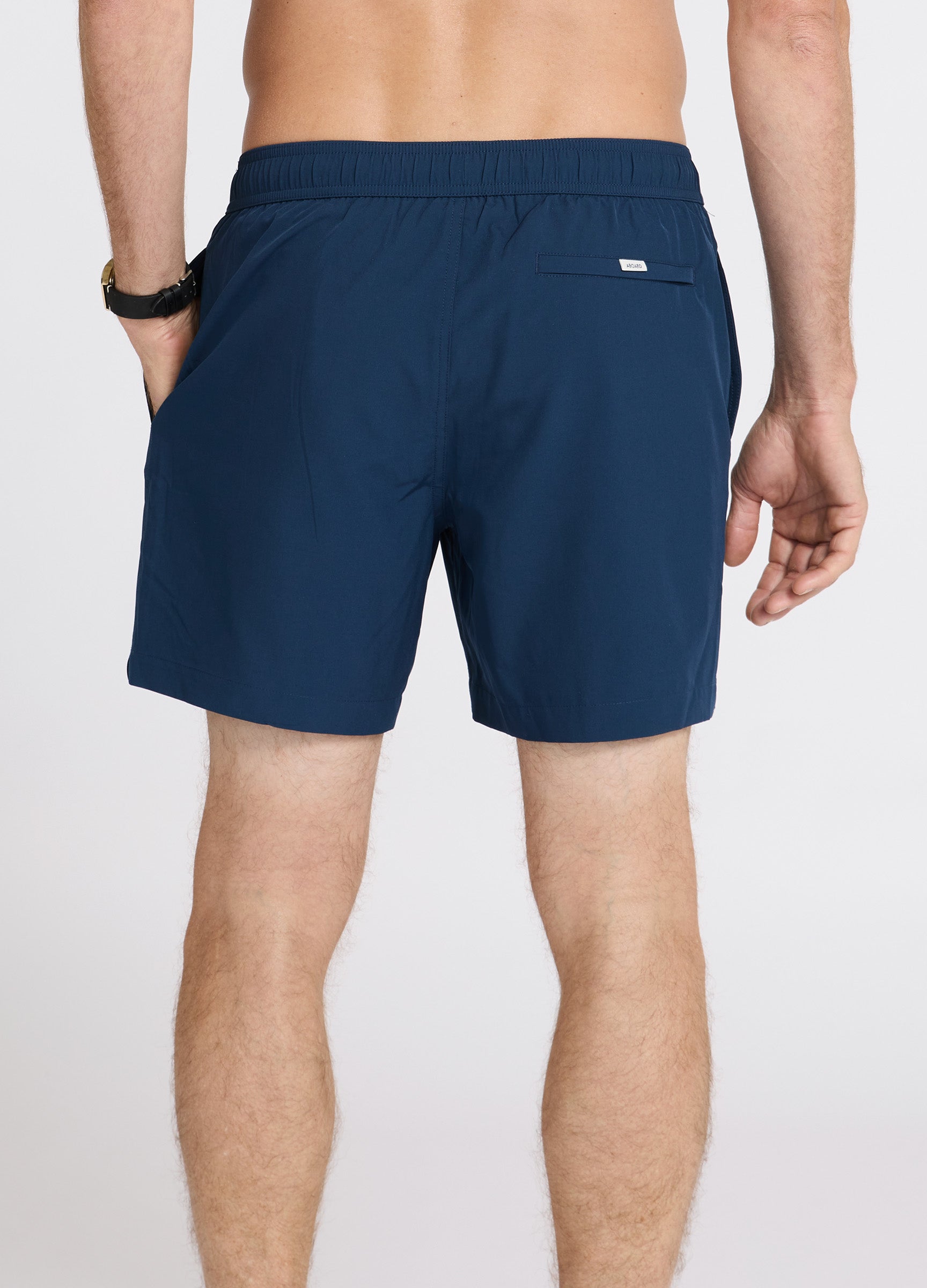 ABOARD Travel Flex Swim Short in navy – quick-dry travel swim short, back view